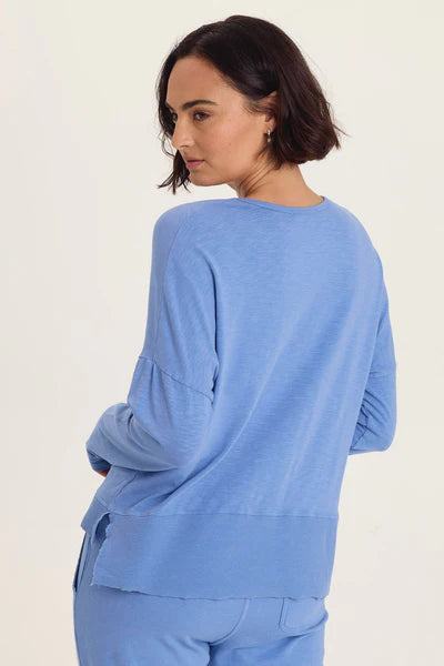 XCVI Wearables Odilia High-Low Long Sleeve V-Neck Top  in Shasta Lake