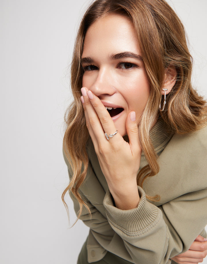 UNOde50 Open ring with white topaz
