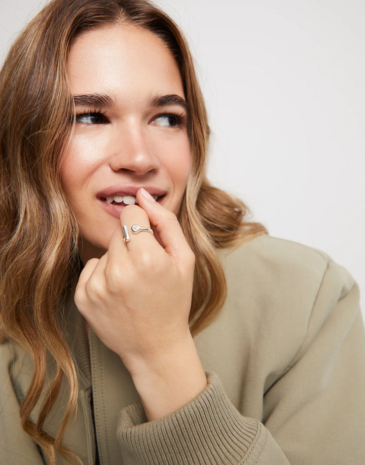 UNOde50 Open ring with white topaz