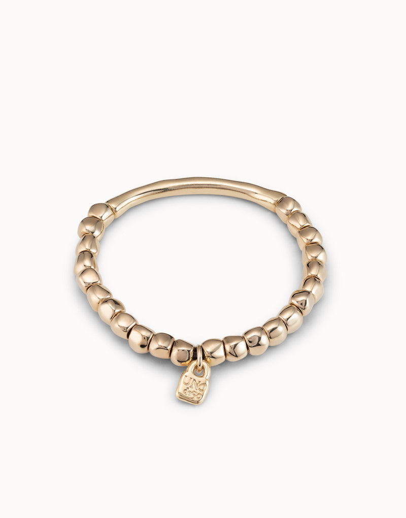 UNOde50 Beaded stretch bracelet with tubular piece- Gold