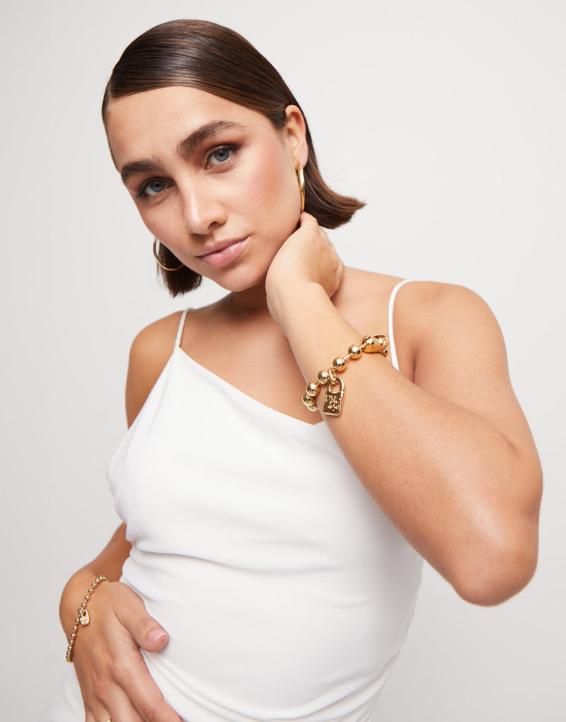 UNOde50 Beaded bracelet with a padlock charm - Gold